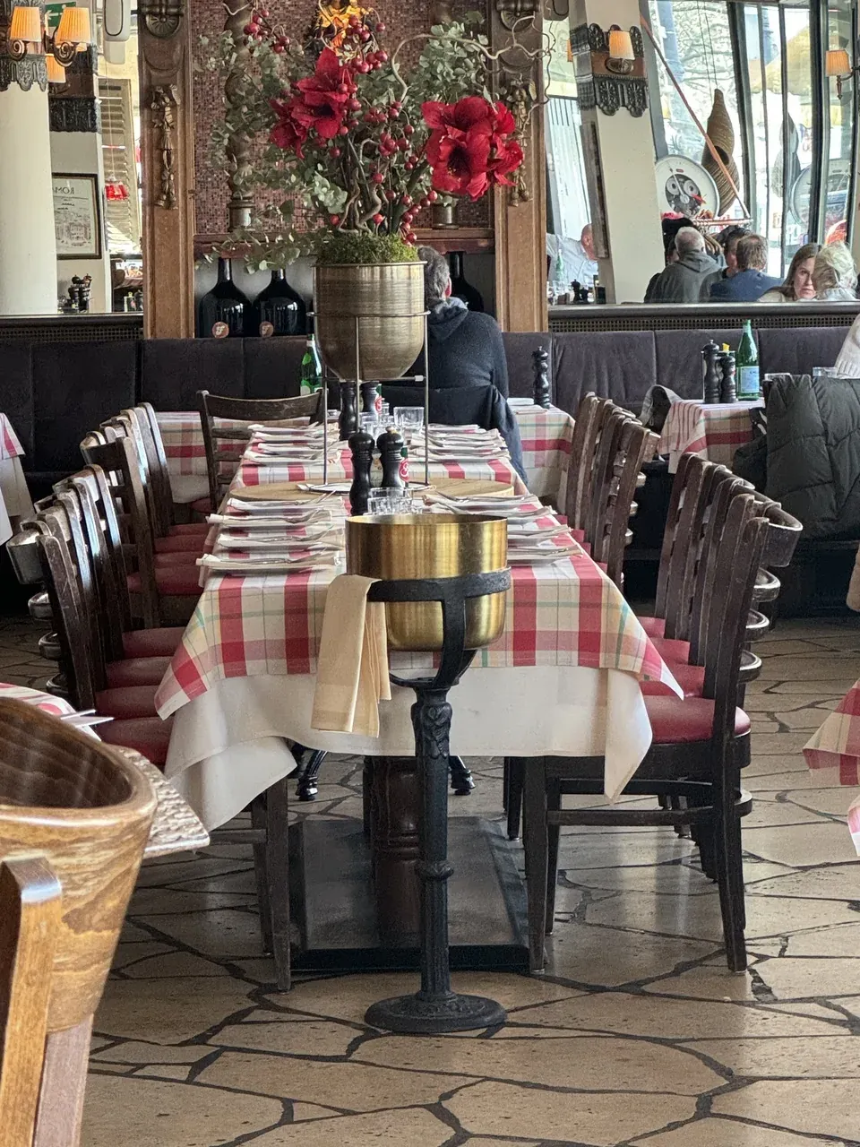 Francucci’s dining room with red-and-white tables and flowers