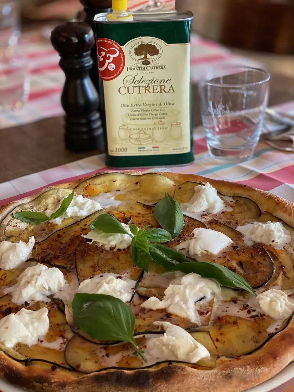 Focaccia Melanzane: spicy aubergine focaccia with basil and extra virgin olive oil, here with buffalo mozzarella